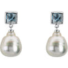 Elegant and Stylish Pair of 06.00 MM and 12.00 MM South Sea Cultured Pearl and Genuine London Blue Topaz Earrings in 14K White Gold, 100% Satisfaction Guaranteed.