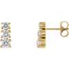 Pair of Cubic Zirconia Three Stone Earrings in 14k Yellow Gold
