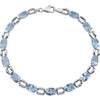 14K White Gold 7X5mm Oval Sky Blue Topaz 7-Inch Bracelet